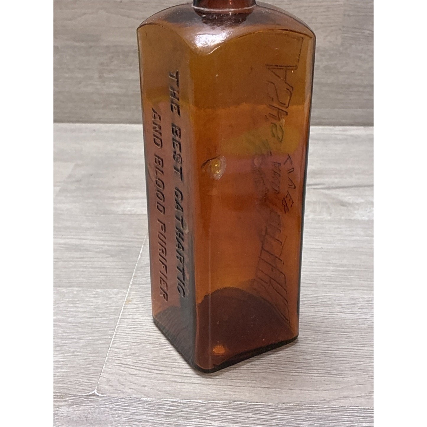 ANTIQUE LASH'S KIDNEY AND LIVER BITTERS CATHARTIC AMBER GLASS EMBOSSED BOTTLE 9”