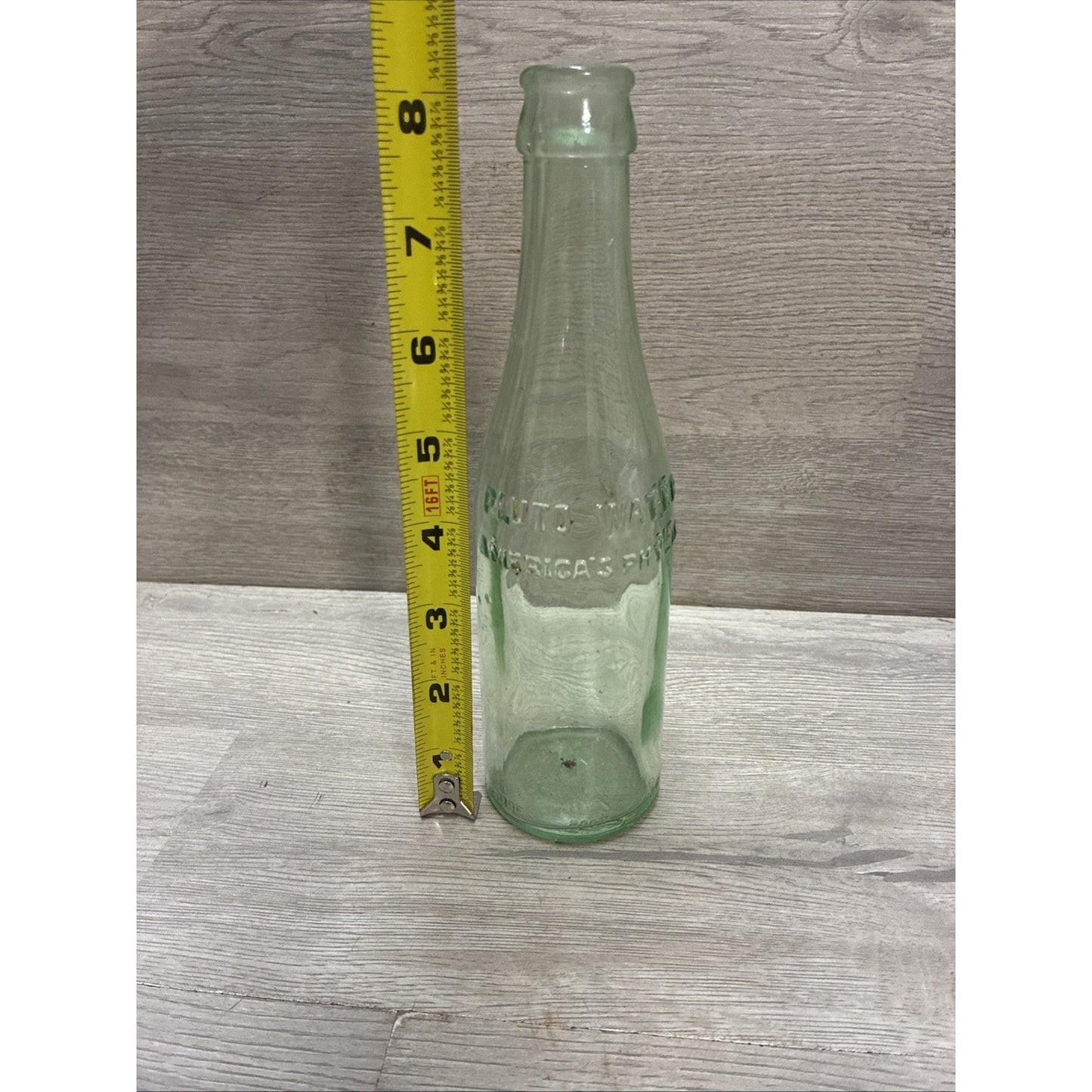 Vintage Crown Top Pluto Water Bottle America’s Physic Devil Embossed Green