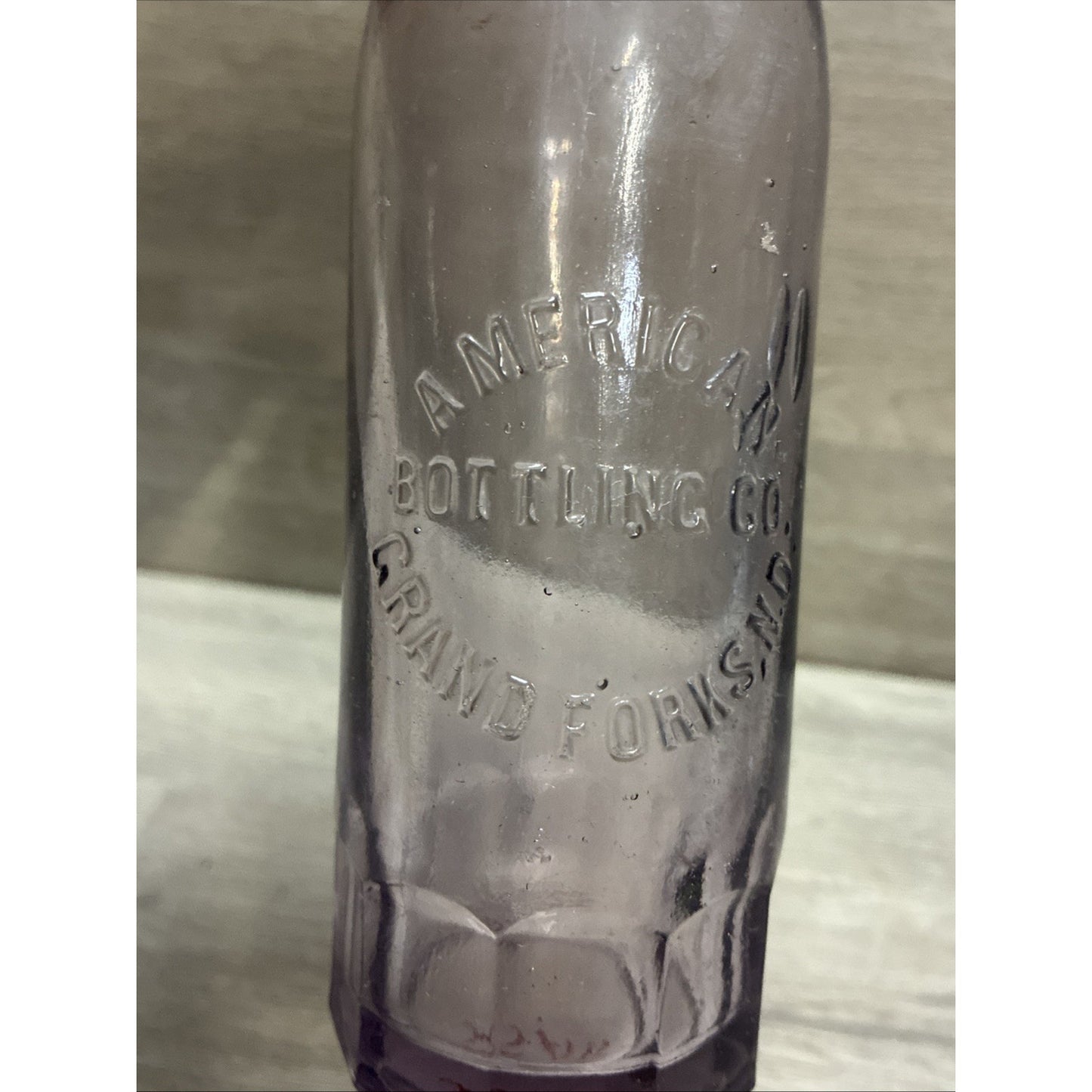 VINTAGE AMETHYST! GRAND FORKS ND BLOWN SODA BOTTLE AMERICAN BOTTLING CO 8.5”