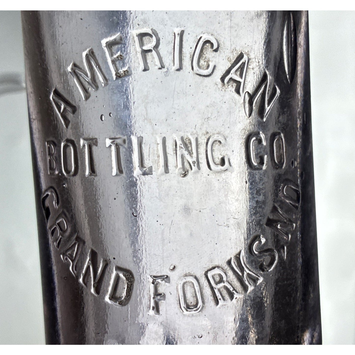 VINTAGE AMETHYST! GRAND FORKS ND BLOWN SODA BOTTLE AMERICAN BOTTLING CO 8.5”