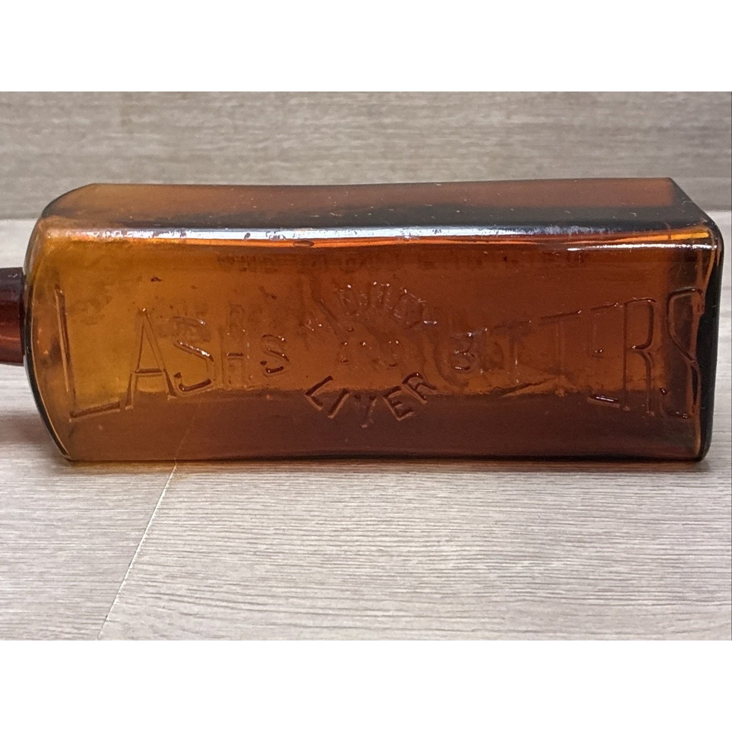ANTIQUE LASH'S KIDNEY AND LIVER BITTERS CATHARTIC AMBER GLASS EMBOSSED BOTTLE 9”