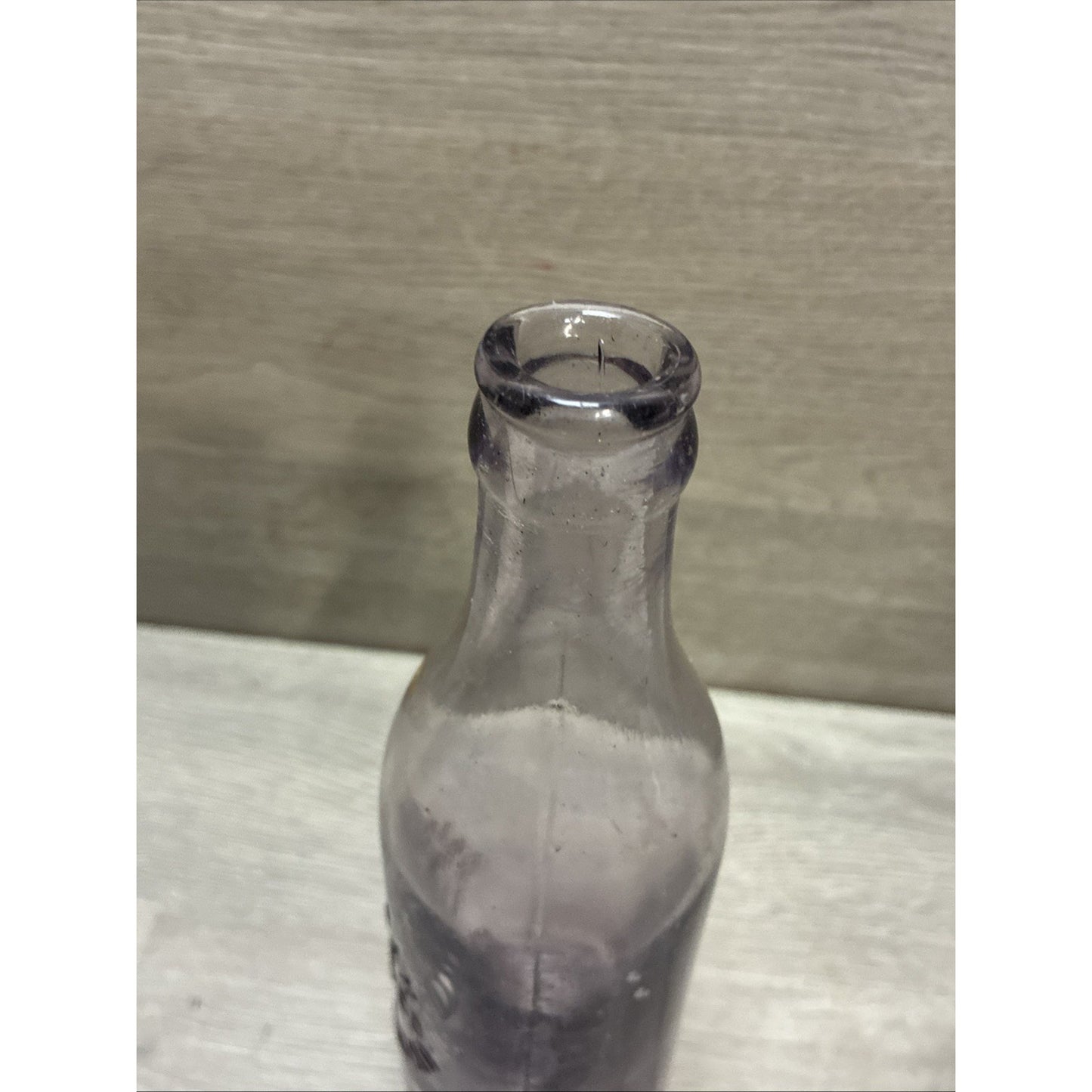 VINTAGE AMETHYST! GRAND FORKS ND BLOWN SODA BOTTLE AMERICAN BOTTLING CO 8.5”