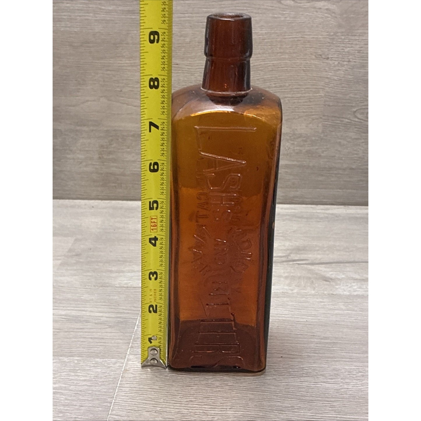 ANTIQUE LASH'S KIDNEY AND LIVER BITTERS CATHARTIC AMBER GLASS EMBOSSED BOTTLE 9”