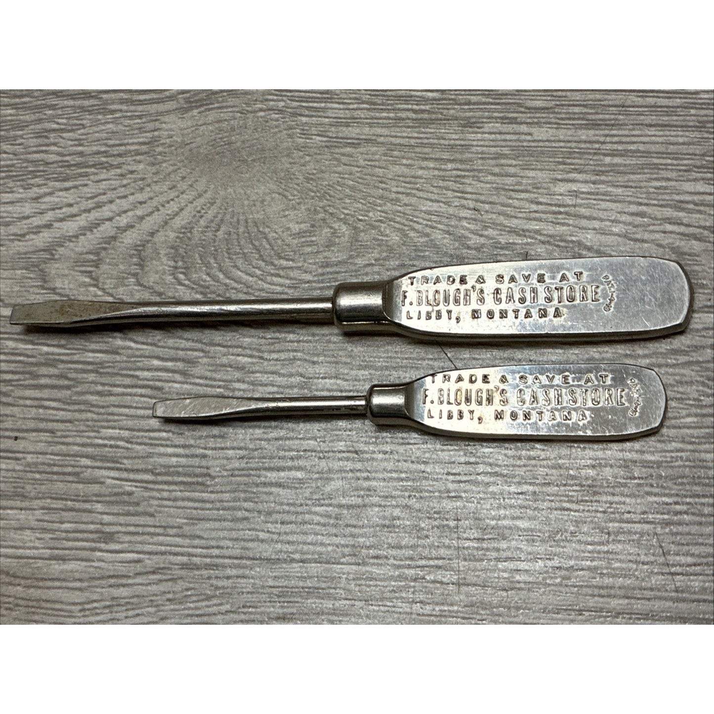 (2) VINTAGE ADVERTISING SCREWDRIVER F. BLOUGH'S CASH STORE LIBBY, MONT.