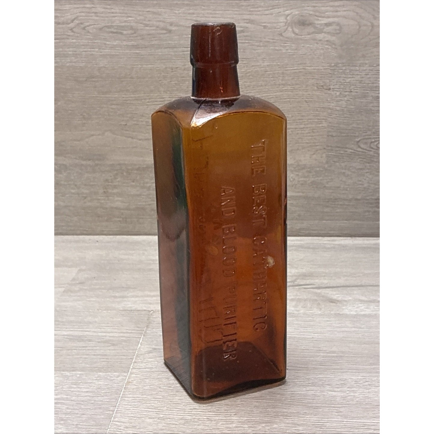 ANTIQUE LASH'S KIDNEY AND LIVER BITTERS CATHARTIC AMBER GLASS EMBOSSED BOTTLE 9”