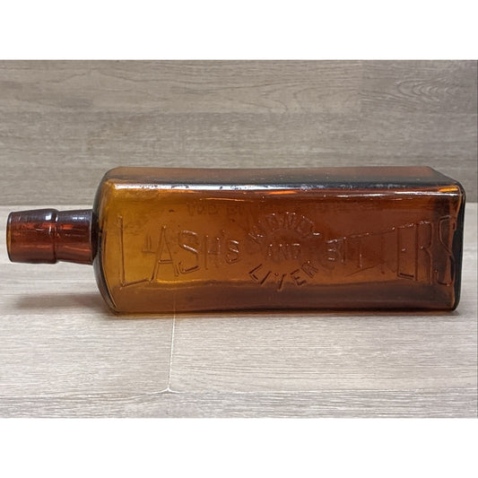 ANTIQUE LASH'S KIDNEY AND LIVER BITTERS CATHARTIC AMBER GLASS EMBOSSED BOTTLE 9”