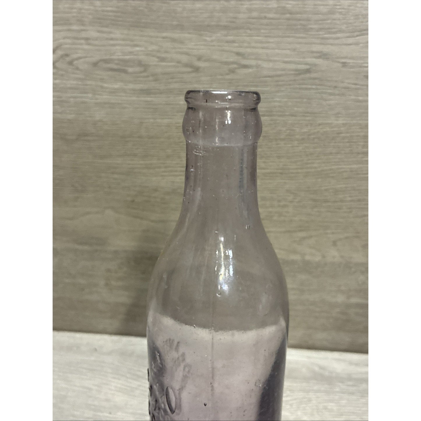 VINTAGE AMETHYST! GRAND FORKS ND BLOWN SODA BOTTLE AMERICAN BOTTLING CO 8.5”